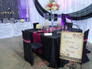 black and pink reception table