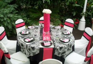reception table amidst tropical plants