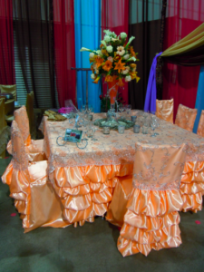 orange sherbert and silver tablescape