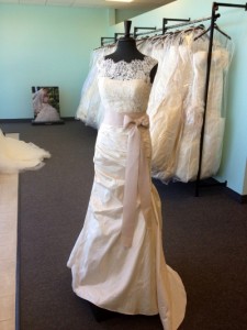 Lace overlay and satin wedding gown