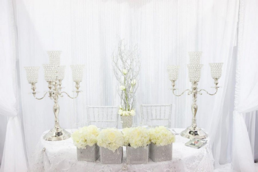 Wedding décor by Jovani Linens & Florals 