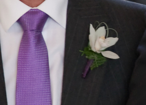 Boutonniere for the Best Man, Father of the Bride and Father of the Groom Using a White Orchid 