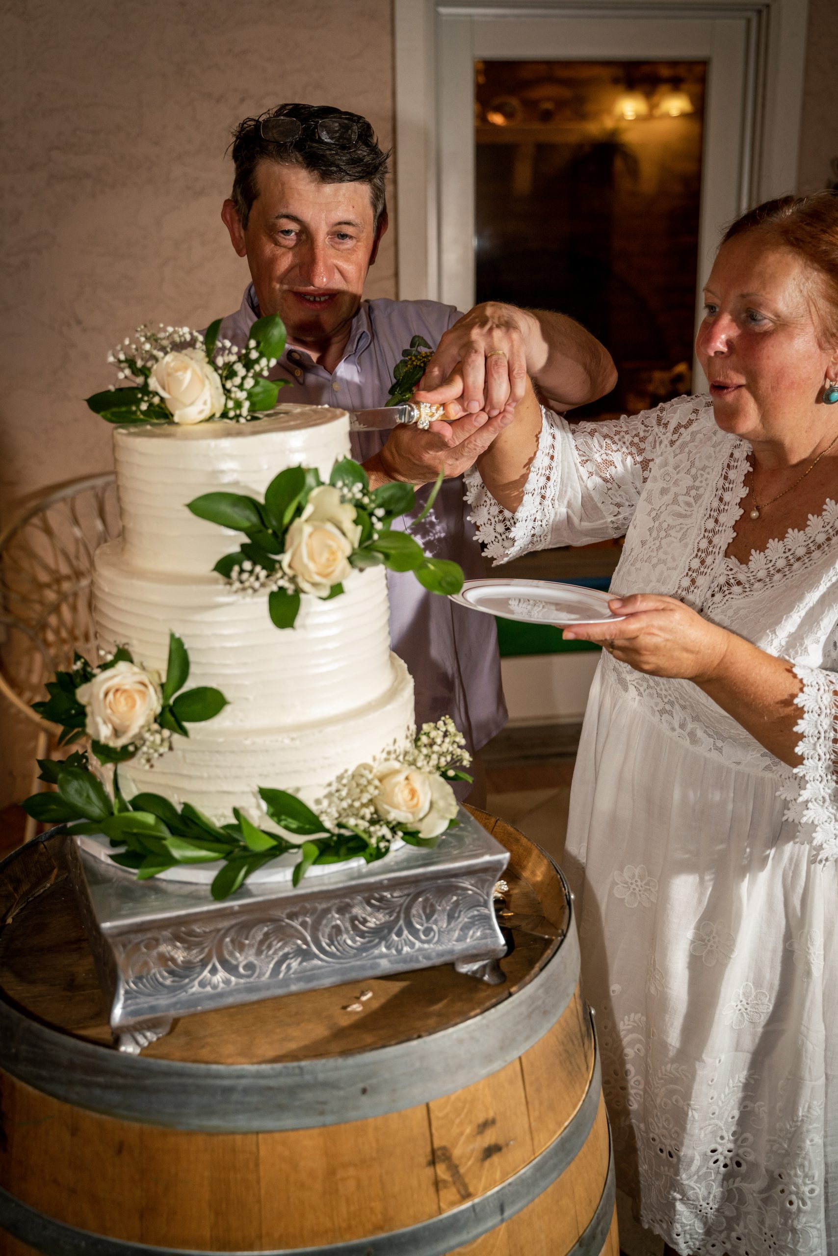 Mature Couple cut the cake at destination wedding in Las Vegas
