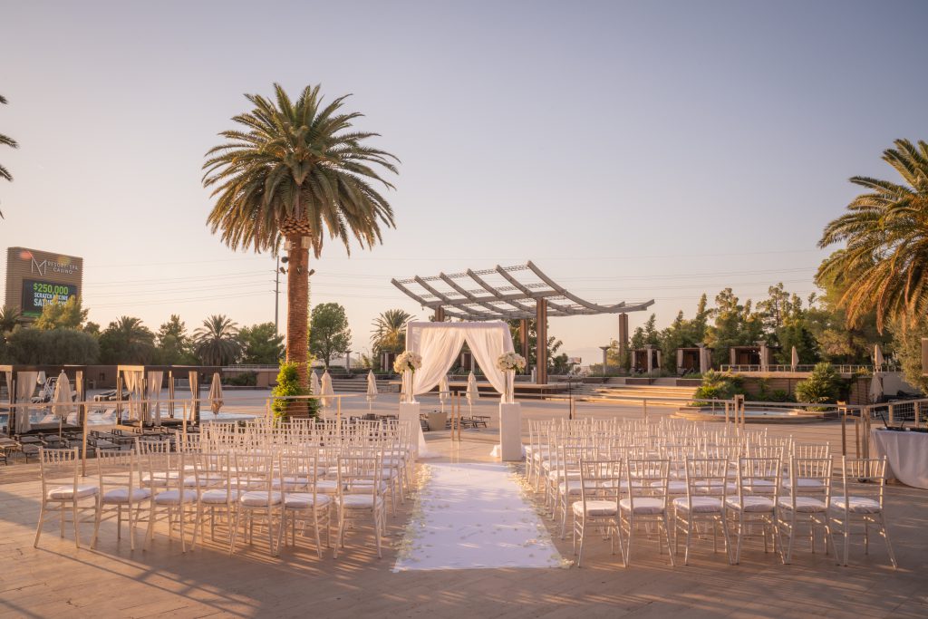 A outdoor ceremony at a luxurious las vegas destination wedding.