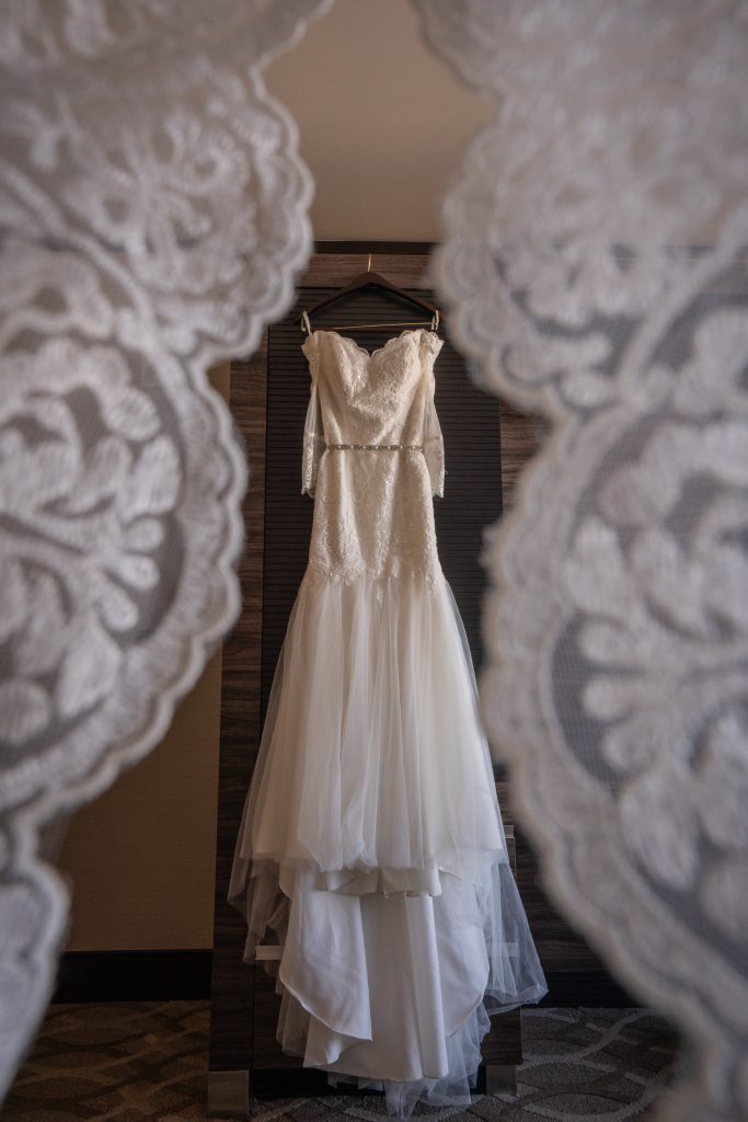wedding gown with lace over lay at a luxurious las vegas destination wedding.