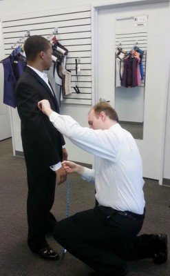 Jerry’s client being measured and fitted by their professional staff.