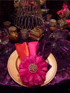 place setting with purple, gold, and orange