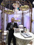 Michael Testagrossa accepts Dazzle Award at Bridal Spectacular